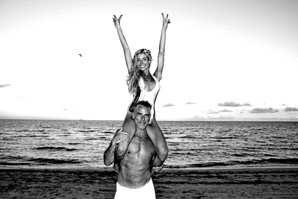 Beach couple love woman