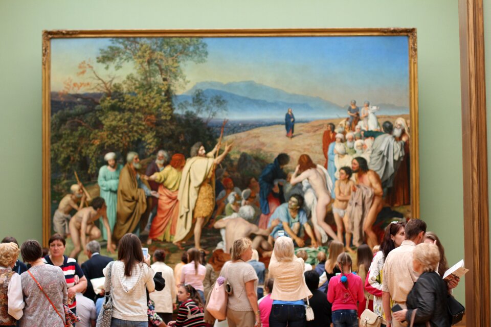 Visitors rush painting