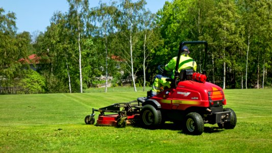 Riding mower in the north soccer field in Brastad 1