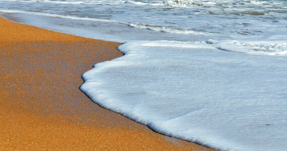 Waves beach sand photo