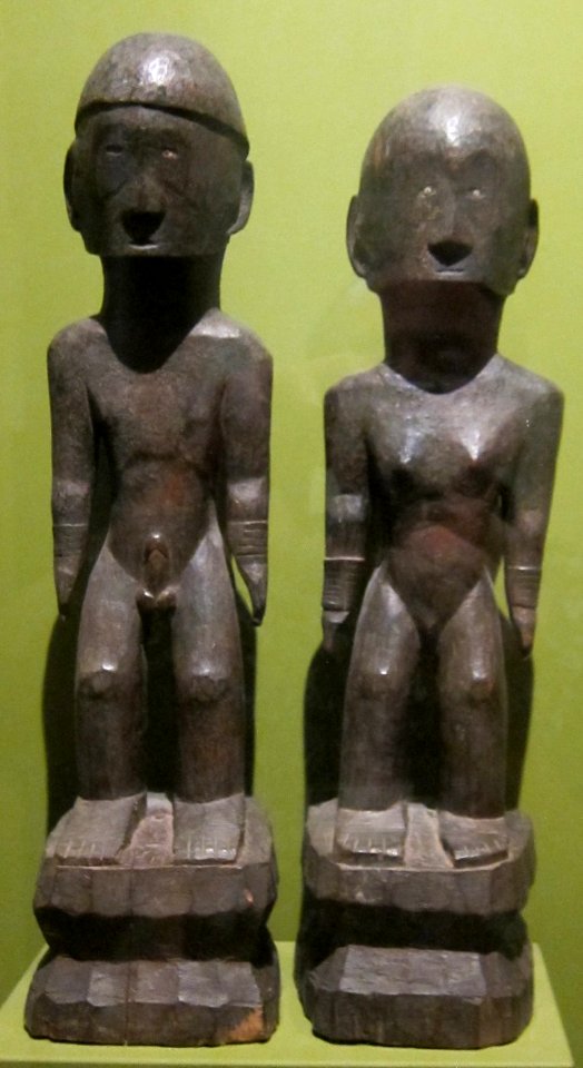 Rice granary guardians (bulul) from Ifugao in northern Luzon, wood with inlaid shells, Honolulu