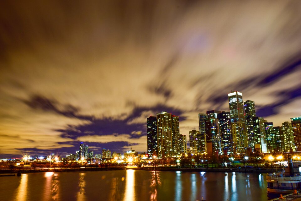 Riverside city at night skyline