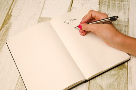 Notebook pen writing photo