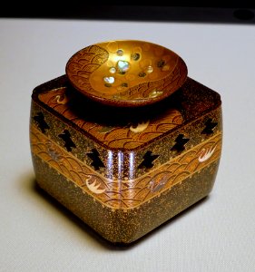 Sake cup and stand in stylized wave and bird design, by Nagata Yuji, Edo period, 1700s AD, maki-e lacquer, mother-of-pearl inlay - Tokyo National Museum - Ueno Park, Tokyo, Japan - DSC08762