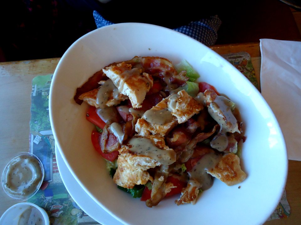 Salad with chicken and onions and other ingredients