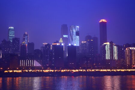 Tall buildings reflection the yangtze river