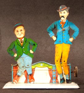 Two tin toy movable figures, pic1 photo