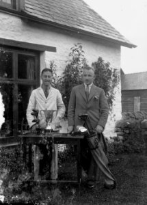 Two men with golf clubs and the Builth Golf Cup (1294334)