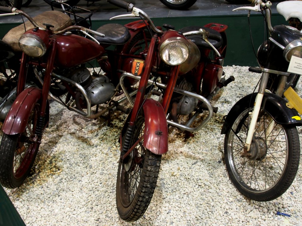 Two red ČZ motorcycles pic2