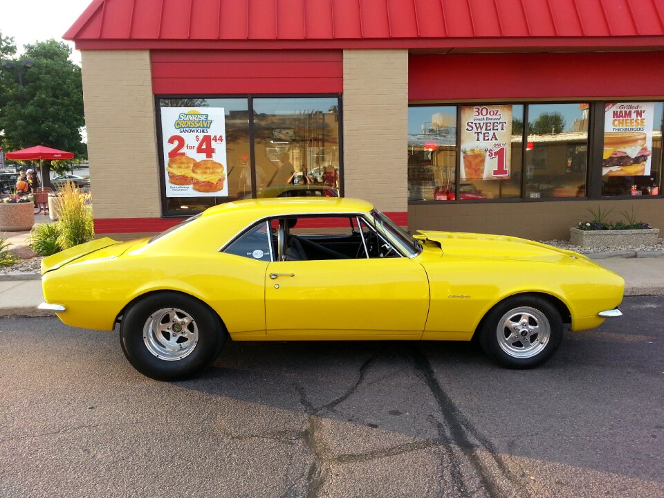 Yellow street rod muscle car