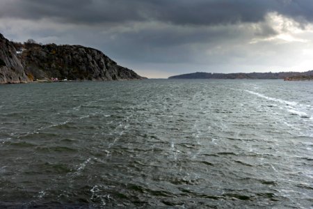 Trails and tendrils of sea foam in Brofjorden photo