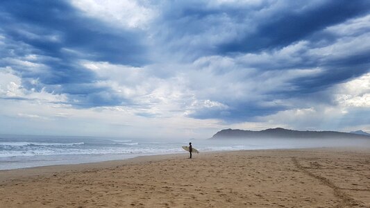 Clouds surfboard summer photo