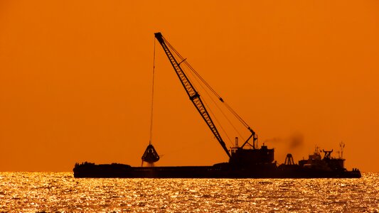 Shadows dredging barge photo