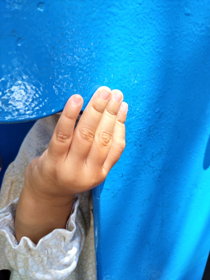 Hand manicure little girl blue