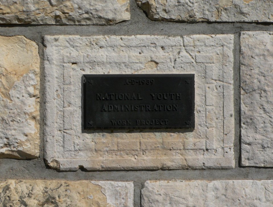 Trego County fairgrounds gates Natl Youth Admin plaque