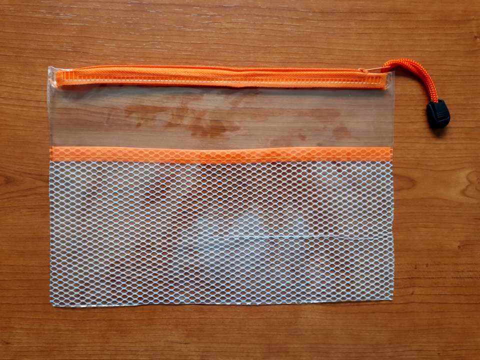 Transparent zipper storage bag with orange zip - 25 x 17 cm - A