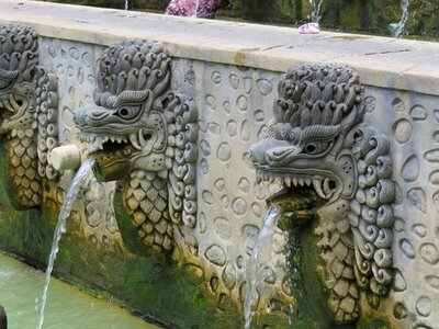 Stone gargoyle lion fountain photo