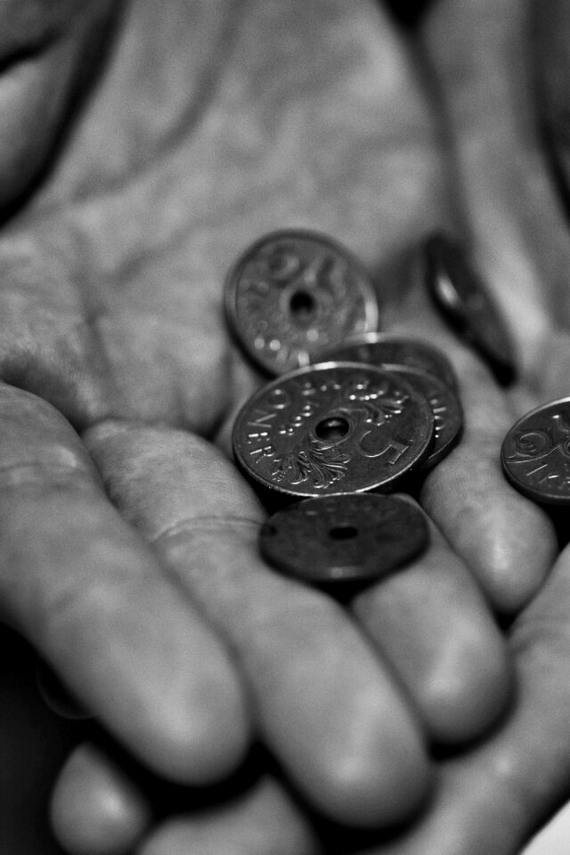 Cash hands gray money