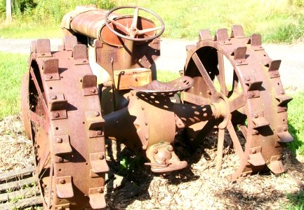 Tractor rusting at farm photo