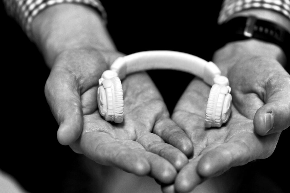 Hands earphone gray music