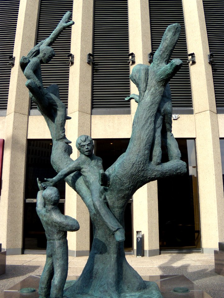 Tree Children sculpture by Leo Mol