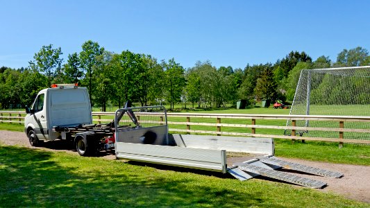 Truck for transporting a riding mower