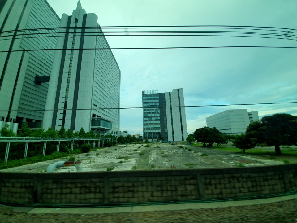 Vacant land surrounded by NEC buildings 2
