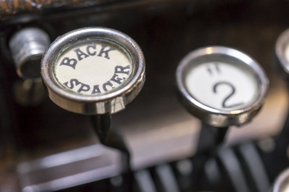 Typewriter back back spacer