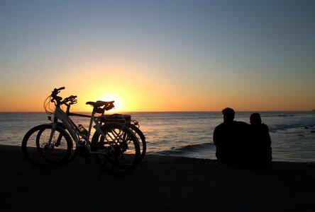 Sunset bicycle couple
