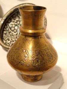 Vase with Inscription Bands and Arabesques, view A, mid 14th century, Mamluk period, Egypt or Syria, incised brass with silver inlay - Sackler Museum - DSC02515