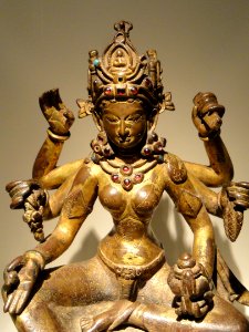 Vasudhara, Goddess of Abundance, view 2, Nepal, 1082 AD, gilded copper inlaid with semiprecious stones, traces of vermilion - Arthur M. Sackler Gallery - DSC06053