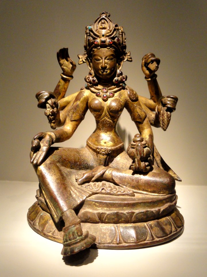Vasudhara, Goddess of Abundance, view 1, Nepal, 1082 AD, gilded copper inlaid with semiprecious stones, traces of vermilion - Arthur M. Sackler Gallery - DSC06033