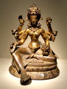 Vasudhara, Goddess of Abundance, view 1, Nepal, 1082 AD, gilded copper inlaid with semiprecious stones, traces of vermilion - Arthur M. Sackler Gallery - DSC06033