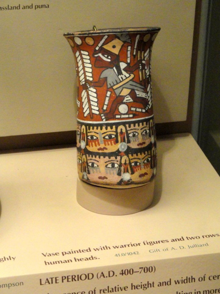 Vase painted with warrior figures and two rows of human heads - Nazca pottery in the American Museum of Natural History -
