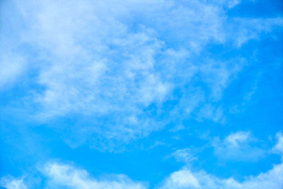 White composition blue clouds