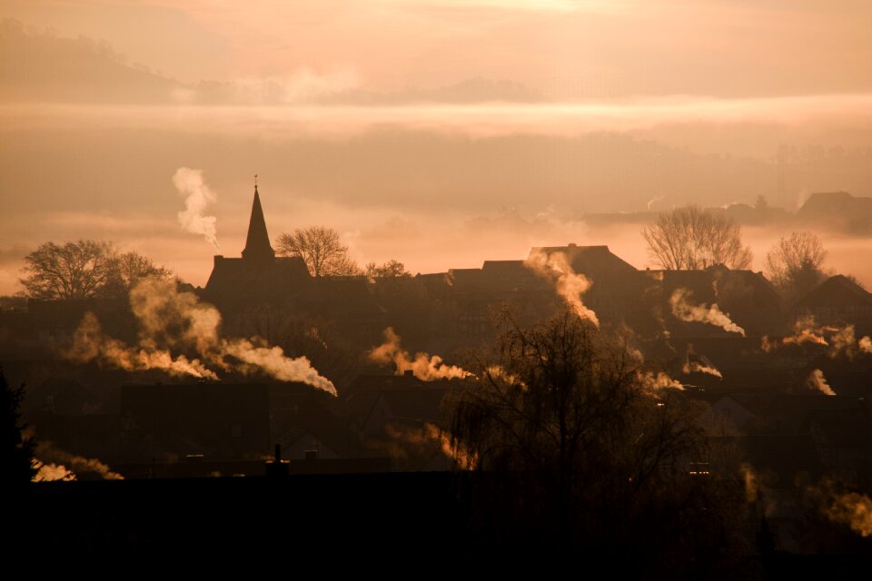 Fog backlighting village