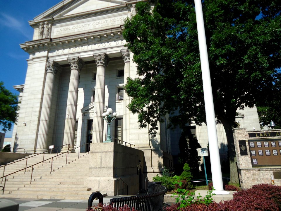 Union County courthouse at Elizabeth New Jersey with tree and flagpole