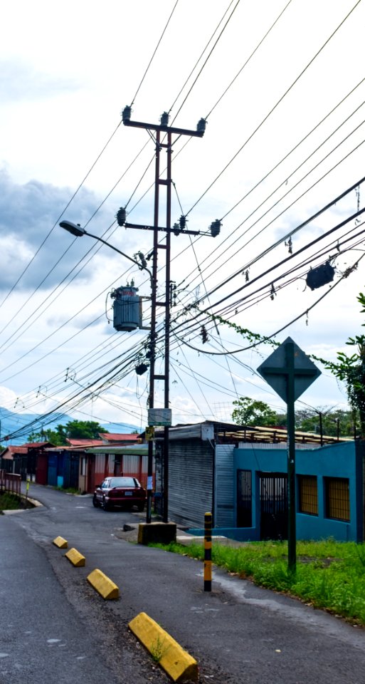 Utility pole made out of Railroad Rail, in Curridabat, Costa Rica