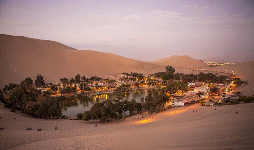 Sandboarding oasis of huacachina desert