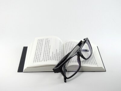 Glasses reading glasses paper photo