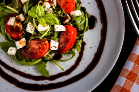 Salad rocket tomatoes photo