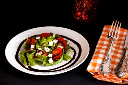 Salad rocket tomatoes photo