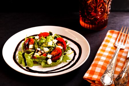 Salad rocket tomatoes photo