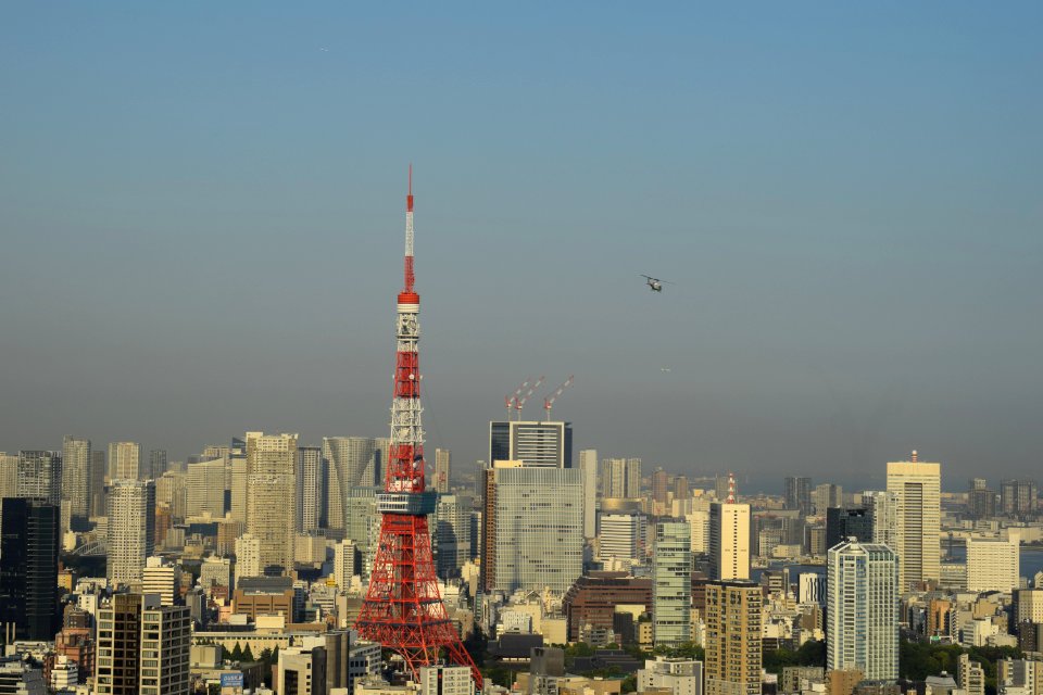 US Air Force helicopter above Tokyo during Trump's visit, Tokyo Tower visible