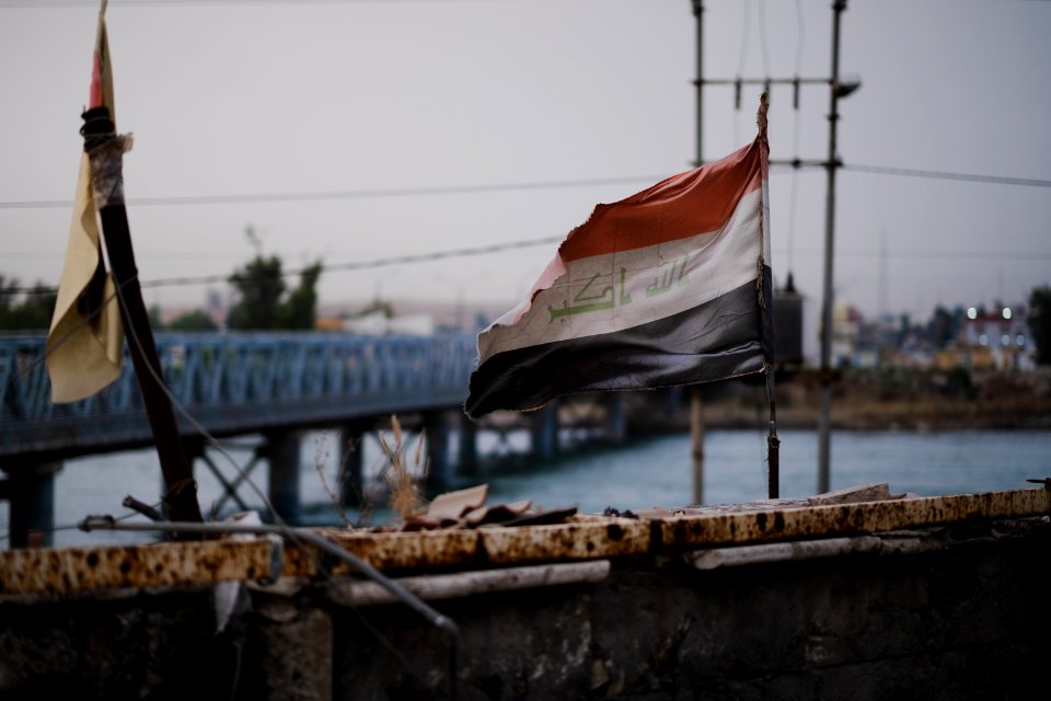 Views of Iraqi flag over the Aghawat Mosque in Mosul in summer of 2019, after its destruction in the war with the Islamic State 10