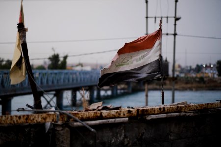 Views of Iraqi flag over the Aghawat Mosque in Mosul in summer of 2019, after its destruction in the war with the Islamic State 10