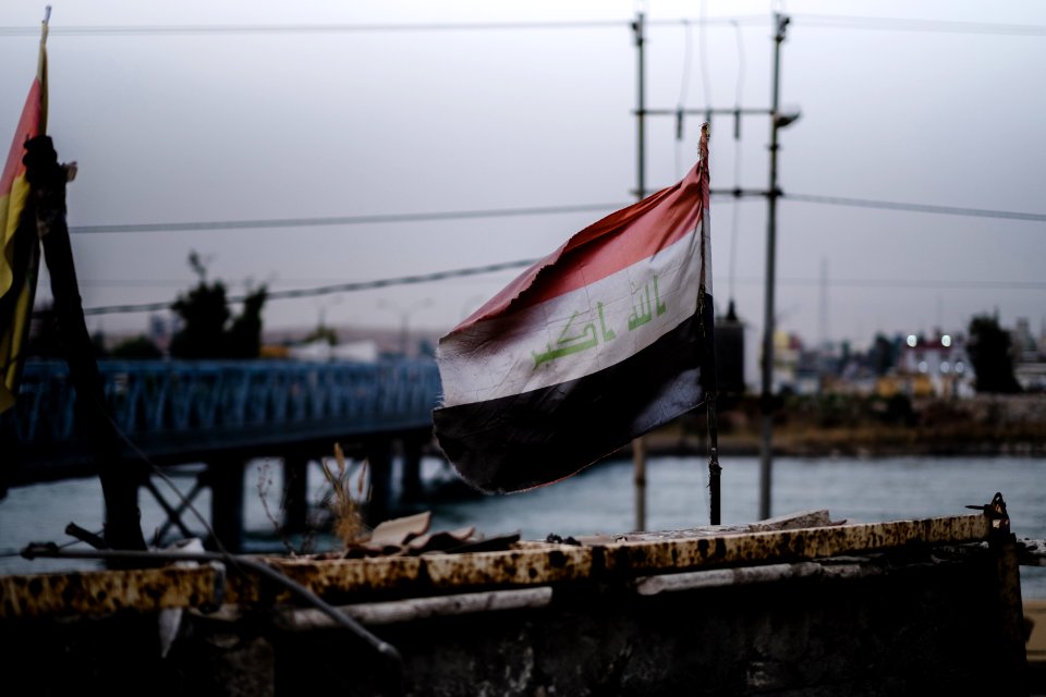 Views of Iraqi flag over the Aghawat Mosque in Mosul in summer of 2019, after its destruction in the war with the Islamic State 11