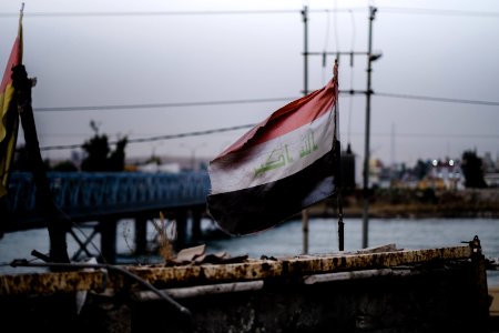 Views of Iraqi flag over the Aghawat Mosque in Mosul in summer of 2019, after its destruction in the war with the Islamic State 11