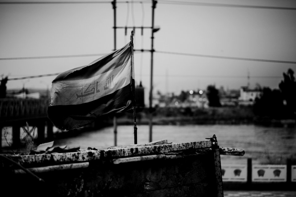 Views of Iraqi flag over the Aghawat Mosque in Mosul in summer of 2019, after its destruction in the war with the Islamic State 13