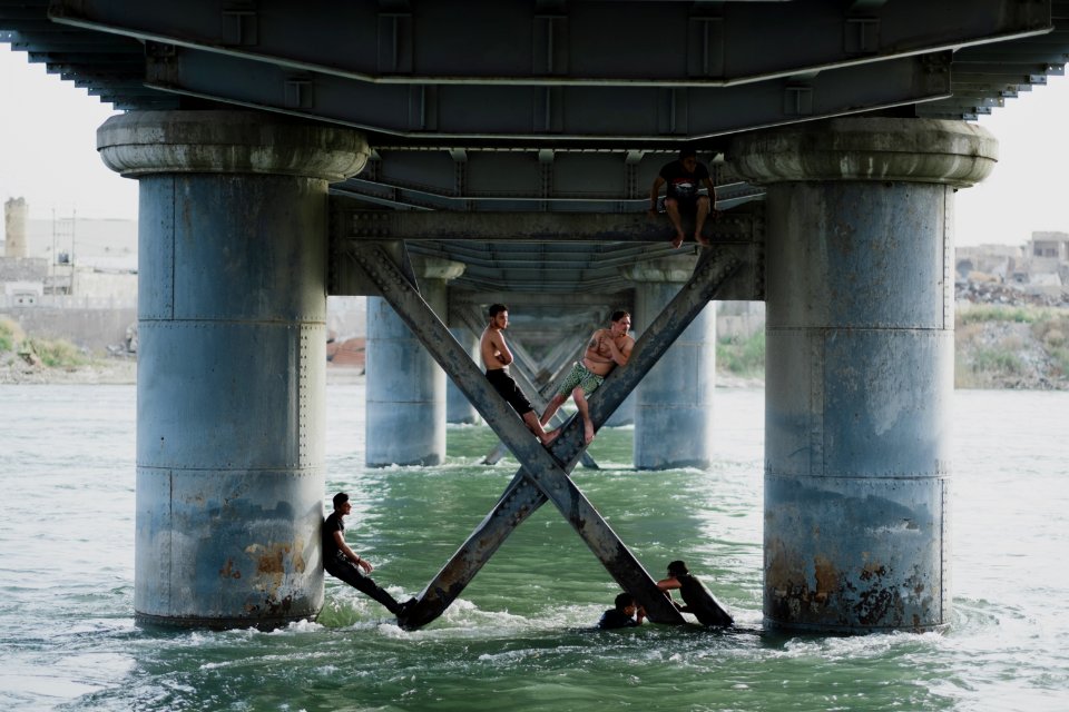 Views along the river Tigris in Mosul in 2019 when Moslawis go during the summer to cool down 21